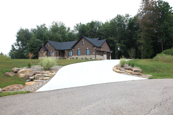 New Home Construction Driveway with Landscaped Culvert